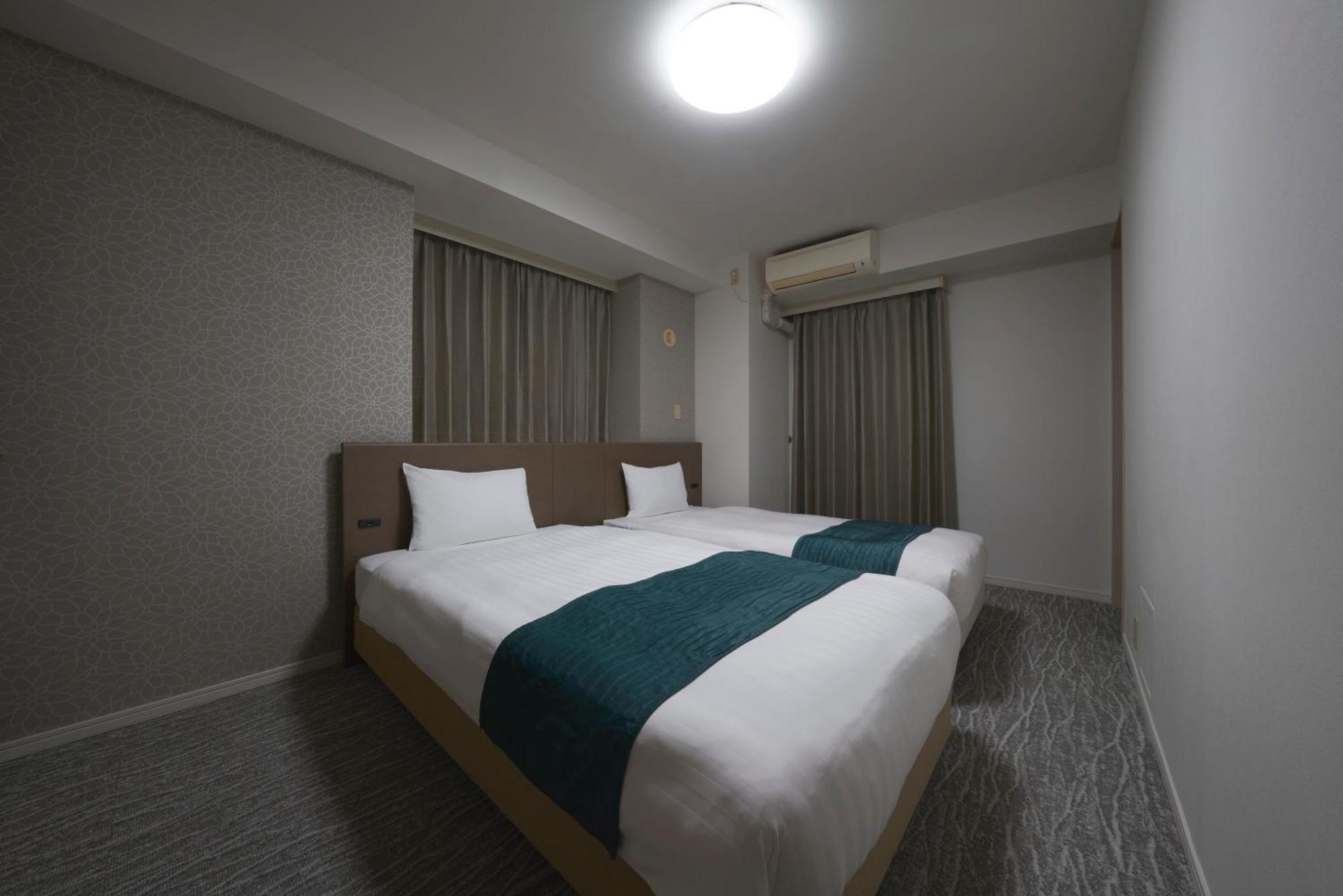 Hotel Village Izukogen Іто Екстер'єр фото